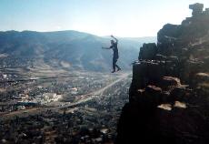 DVC student Robbie Shields is seen high-lining on a 1-inch nylon strap. (Robbie Shields)