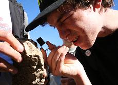 Geology student Marc Litchterman inspects shell fossils at Lafayettes Briones Regional Park. ()