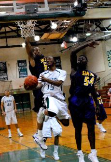 DVC point guard Gary Pinkney, jumps for a lay-up in the 4th quarter of the Nov. 30 game against San Jose City College. ()