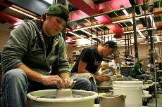 Ceramics student Jim Jordan works on potter piece in the ceramics studio. ()