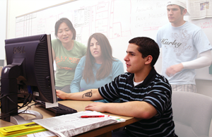 Jerry Backman Jr., editor in chief during the spring 2008 semester, and the Inquirer staff work on headlines during a late-night production session. (Adalto Nascimentp)