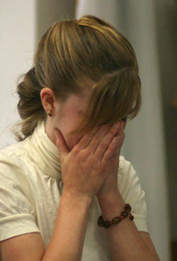 Lindsay St. Hill cries movments after the Election Commitee found the UAID coalition guilty of two election code violations. (Zach Becker)