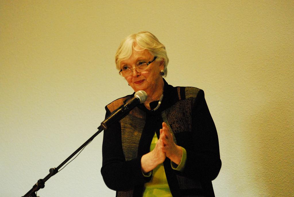 President Judy Walters gives a round of applause to those who helped the school through the accredation process during a meeting on Feb. 2, 2010. ()