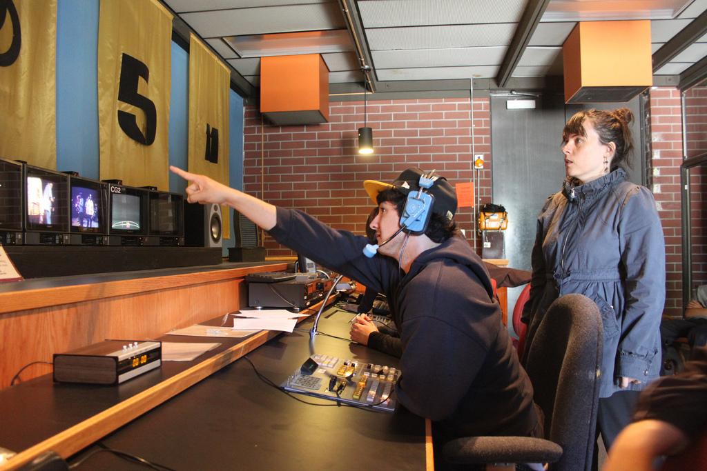 Broadcast instructor Kristy Guevara-Flanagan and student Tim Finn work in the broadcast studio. (Chris Corbin/The Inquirer 2010)