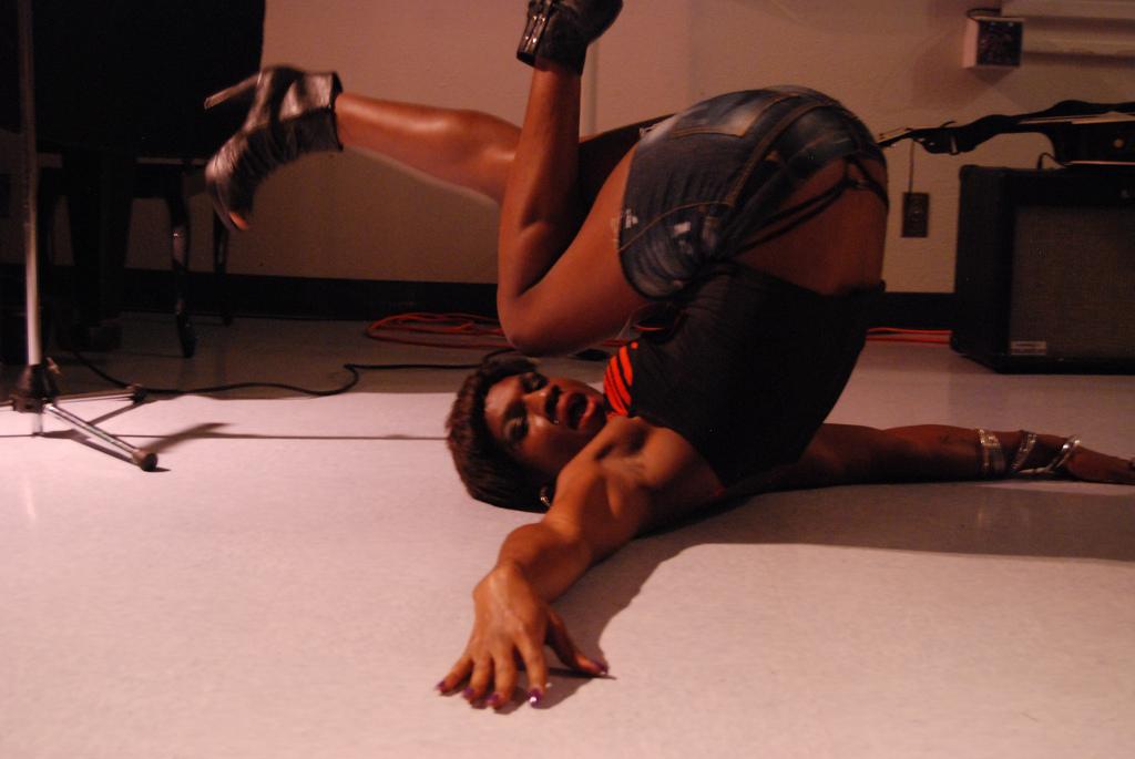 David Carson shows just how flexible one can be when performing the song Rude Boy by Rihanna at the QSA Variety show. (Photo by Courtney Johnson/The Inquirer 2010)