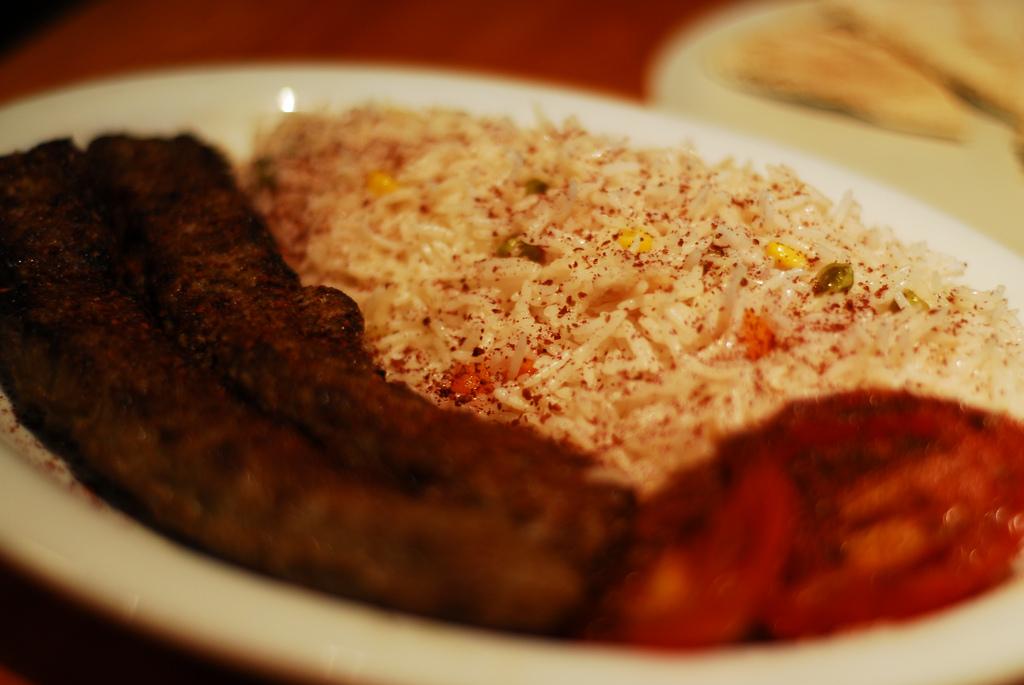 The Shami kabab, served with fresh basmati rice and lightly grilled tomatoes. (Chris Corbin/The Inquirer, 2010)