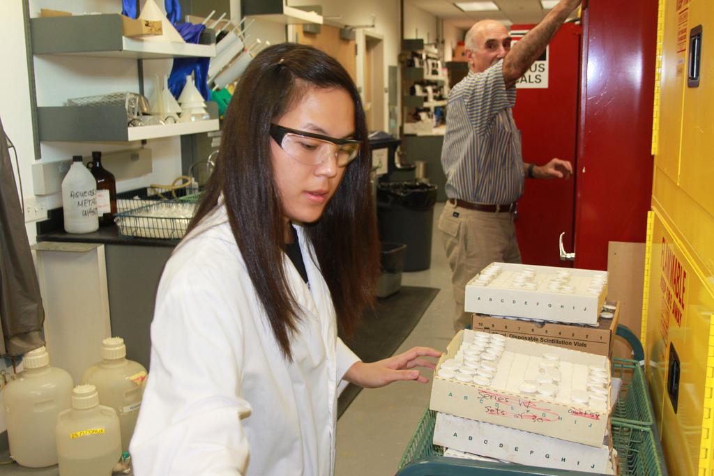 Student Chemistry Stockroom worker Euna Kim organizes supplies while in the Chemistry Stockroom. (Julius Rea/ The Inquirer 2010)