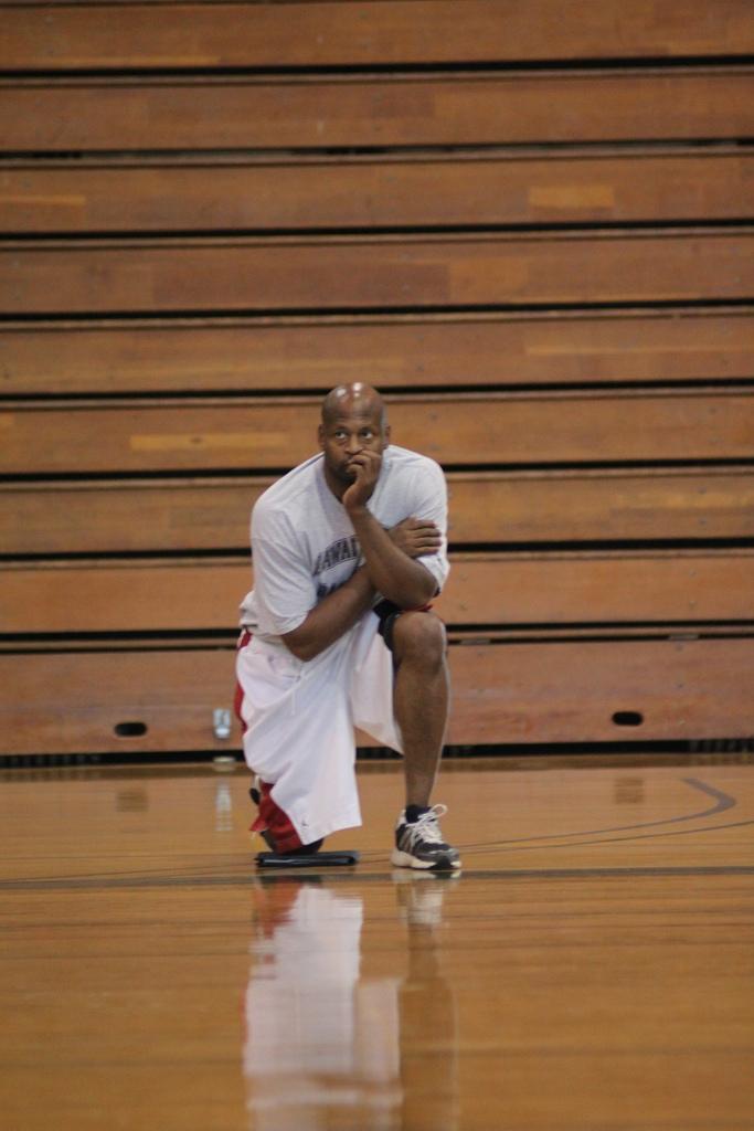 Womens basketball coach Ramaundo Vaughn observes his team during practice. (Carly  Jones/The Inquirer 2010)