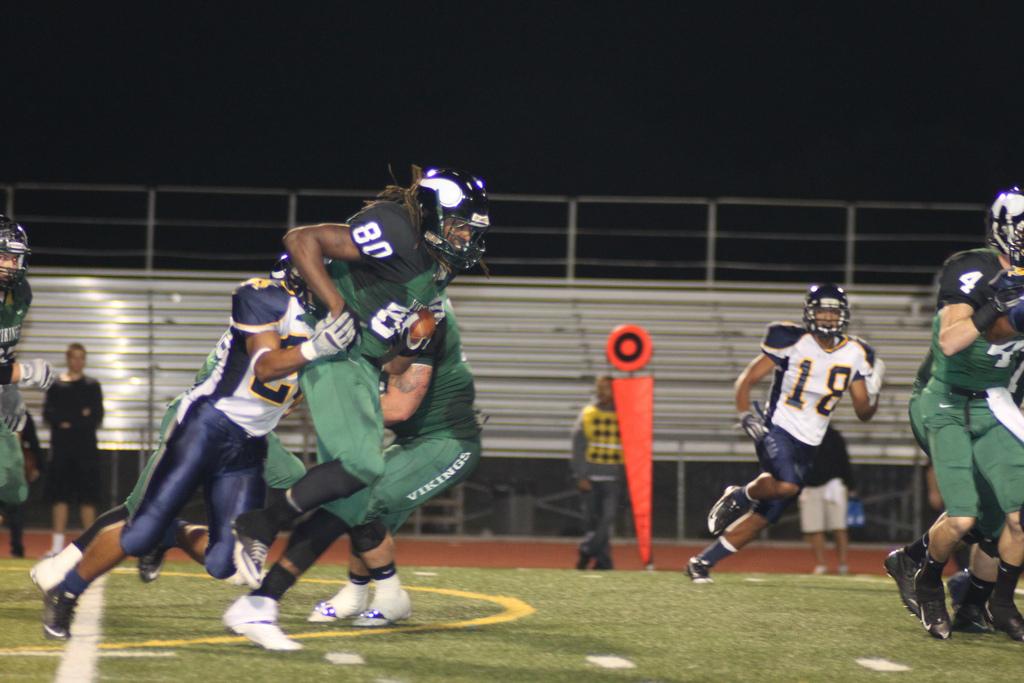 Wide receiver Diante Jackson fights for extra yards after the catch. The Vikings beat Merced College 62-6 on Nov. 5. (Travis Jenkins/The Inquirer)