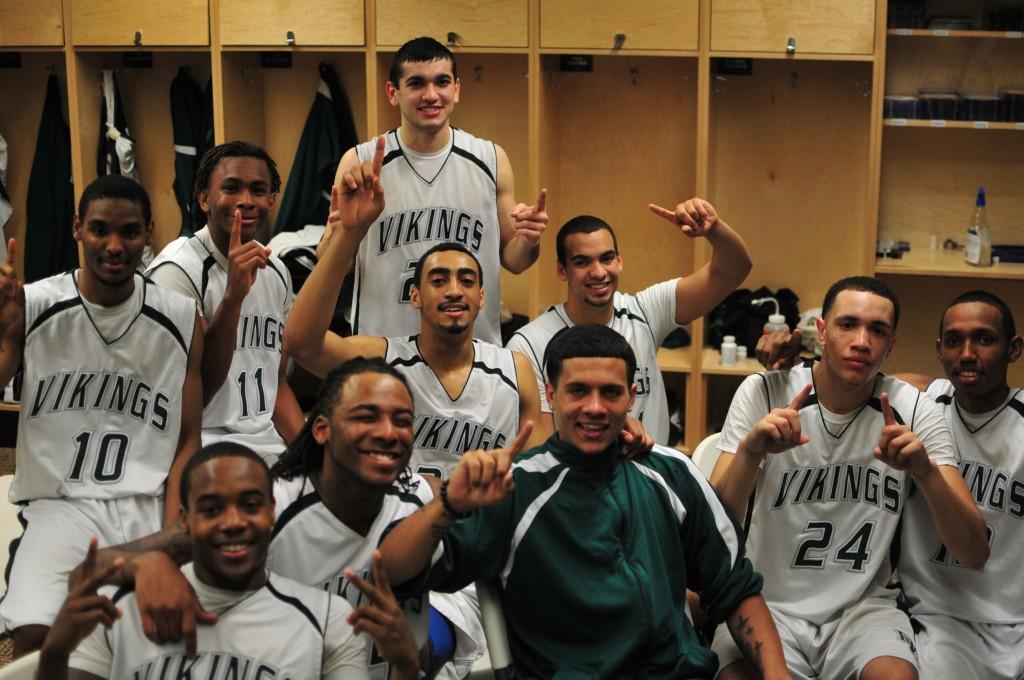 The DVC basketball team sits together in the team room after a win. (Alec Graham/The Inquirer)