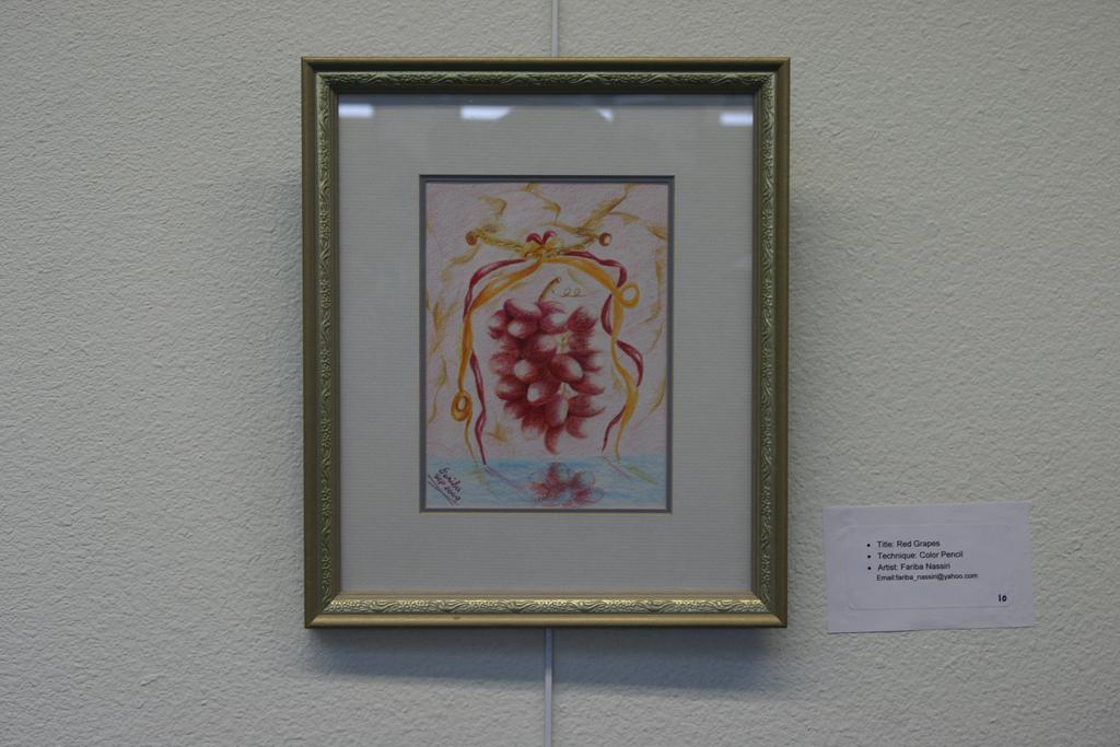 Red Grapes is one of the more than 40 paintings by Fariba Nassiri apart of the librarys new exhibit, Life. (Pablo Caballero / The Inquirer)