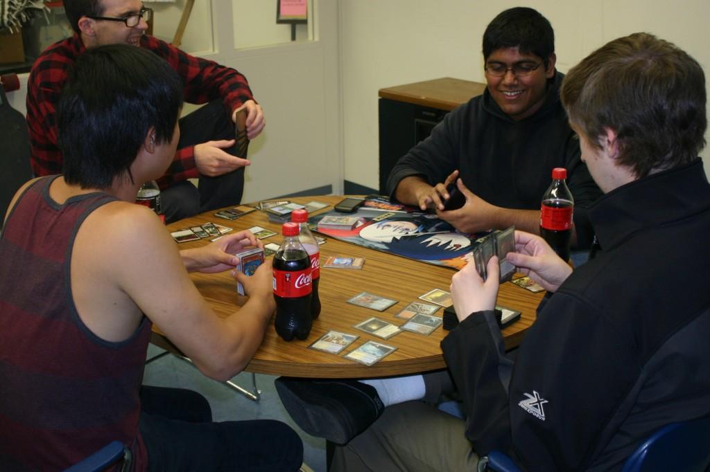Left to right; Richard Mix, Victor Lang, Ayan Chattes and Kyle King play card games (Pablo Caballero / DVC Inquirer)