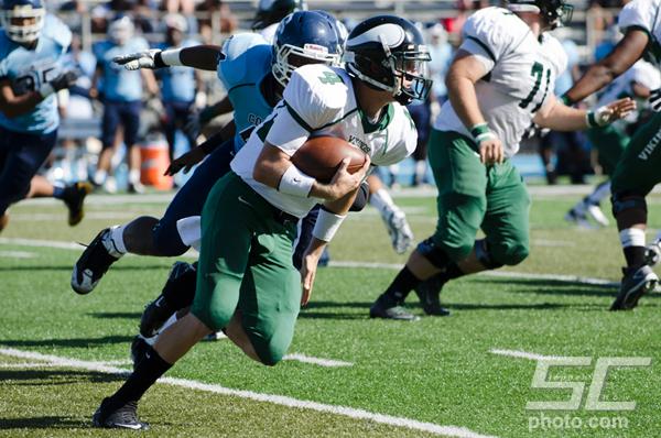 Quarterback Spencer Van Brunt tucks the ball and runs up field at Contra Costa College. (Stevie Chow / The Inquirer)