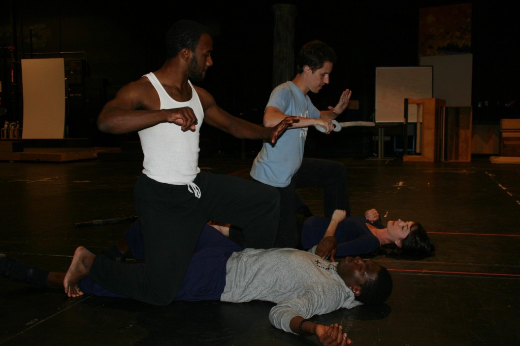 Cyle Swanstrom, top right, and Atessa McAleenan-Morrell, bottom right, prepare for the struggle scene between Romeo and Tybalt with Dennis McCaffrey, top left, and James Udom, bottom left. (Sean Wilkey / The Inquirer)