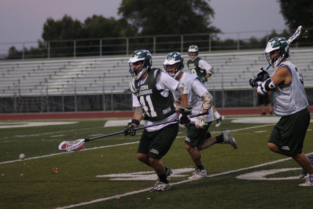 Lacrosse players on the run. (Danielle Barcena / DVC Inquirer)