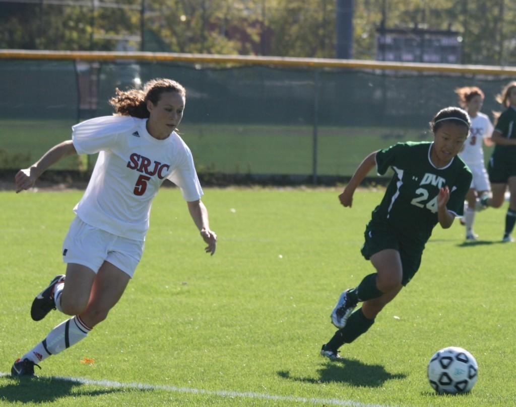 Raina Saunders, No. 24, steals the ball away from Santa Rosa Junior College’s leading scorer Cara Curtin during their Oct. 7th match. The game ended in a 2-2 tie. (Stephen Langsam / The Inquirer)