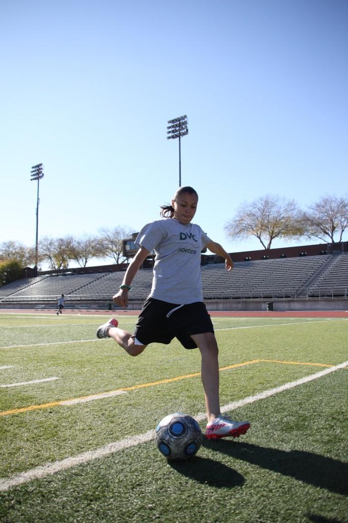 Wendy Magarin shoots on goal while practicing at Viking stadium. She leads the team this season in goals and points.  ()