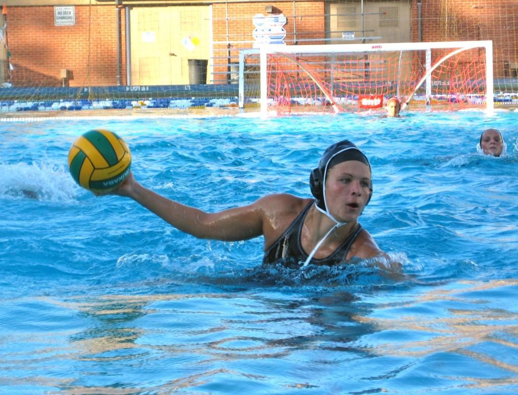 Carolina Socha takes a successful shot in DVCs 16-2 win against Fresno City College. DVCs womens water polo team took first in NorCal and third in state. ()