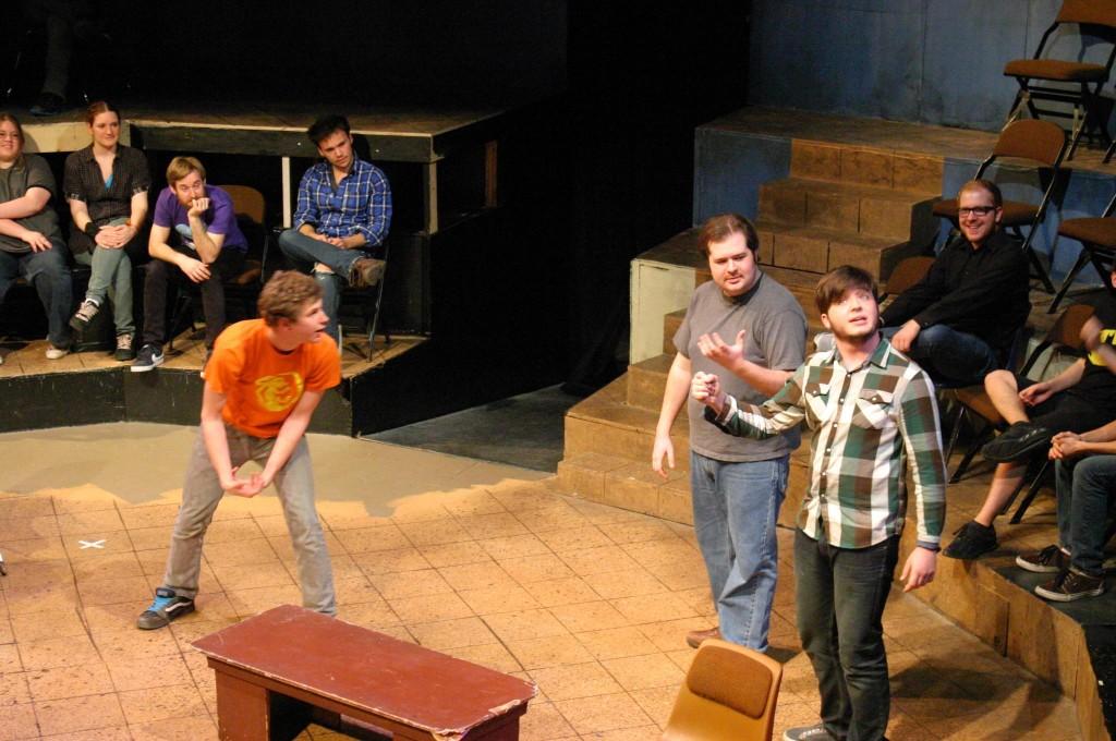 Fancy Dinosaurs members (left to right) Craig Whitaker, Jay Speck, and Parker Nevan perform a series of scenes in improv game Blackout (Sean Wilkey / The Inquirer)