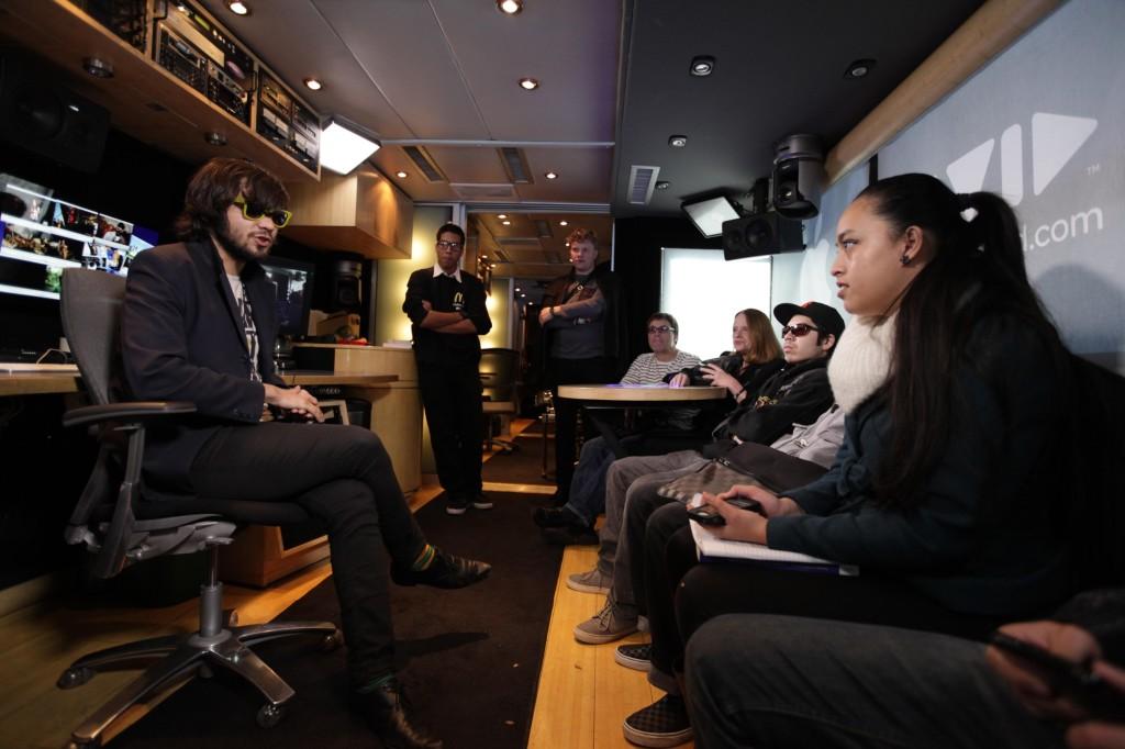 Kyle Baudour provides a tour to DVC students of the John Lennon educational tour bus, which stopped at DVC thursday afternoon, Feb. 9 (Mike Alfieri/ The Inquirer)