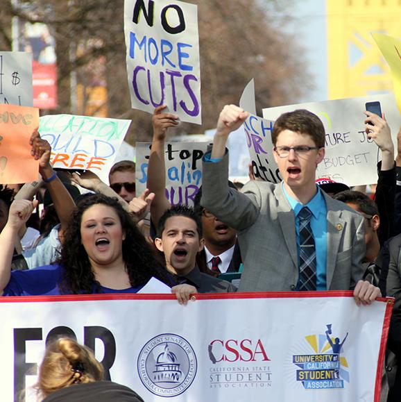 Student Senate of California Community Colleges President Rich Copenhagen leads the march of students to the State Capital Building (Hakeem Montes/The Inquirer)