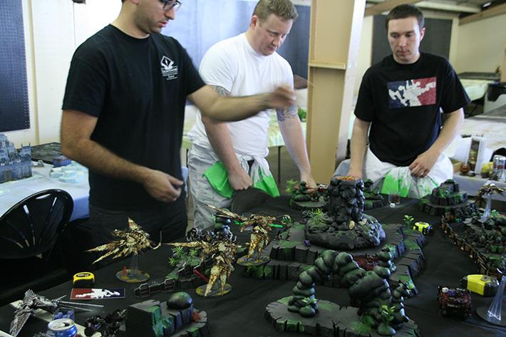 Dan May and DVC alum Frankie Giampapa organize their armies at local Warhammer 40k competition. (Pablo Caballero/ The Inquirer)