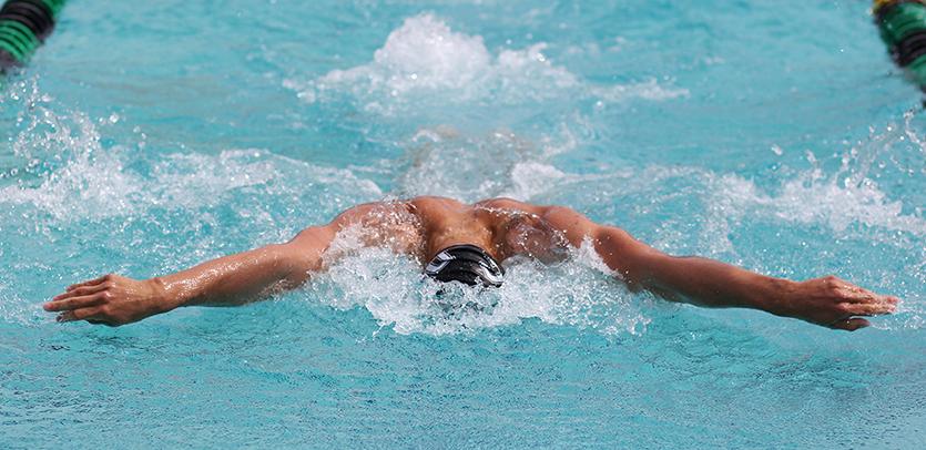Montana Randall places first in the 100-meter butterfly at the Big 8 Conference held at Diablo Valley College on March 15. (Karin Jensen / The Inquirer)