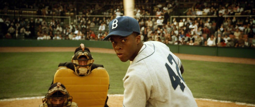Jackie Robinson (Carlos Julian Colon) stares down an opposing pitcher as well as race barriers in the upcoming film. Will the film tell the whole story? (Courtesy of Warner Bros. Pictures)