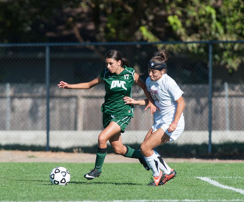 Delia Jimenez Midfileder (#17) of DVC gets control of the ball against Fresno Moriah Rodriguez Defender (#24). The Vikings lost to Fresno City College on Sept.17, 2013. Pleasant Hill, CA. (Andrew Barber/ The Inquirer)