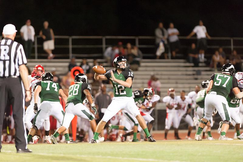 Backup quarterback Adam Wood locks in on his target, leading the Vikings on their only scoring drive of the game. (Andrew Barber/ The Inquirer)