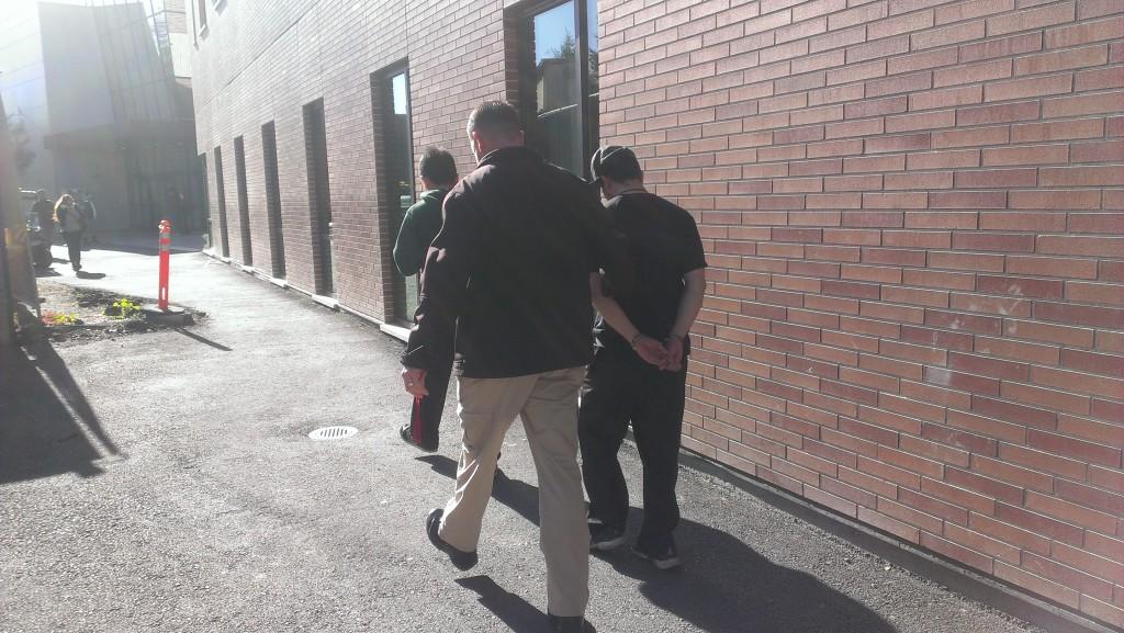 After an altercation in the Student Services Center on Thursday Dec. 5, the person in the hat (right) was brought to Police Services in handcuffs.

Witnesses said they believed the altercation was between a student (right) and a staff member.Photo credit: Benjamin Davidson.