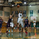 Sabrea Coleman makes a shot on the basket