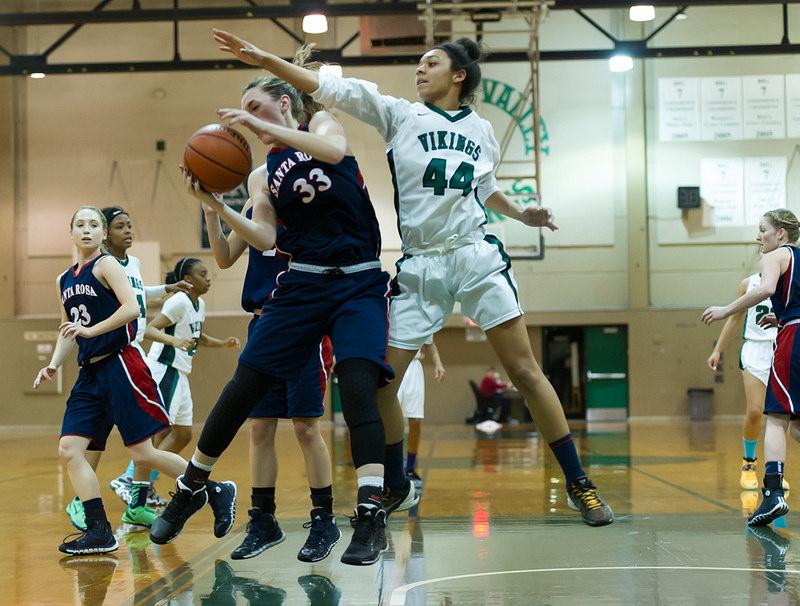 Diablo Valley Colleges Petrice Beattie tries to get the rebound from Santa Rosa Junior Colleges Erin Skinner in the second half. DVC lost to SRJC 94- 87 on Jan. 24, 2014. Pleasant Hill, Calif. (Andrew Barber / The Inquirer). 