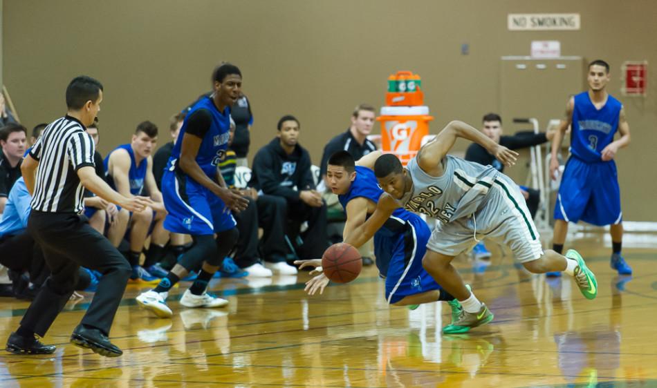 DVCs Devon Pouncey gets a steal from Modesto Colleges Eric Melgar late in the second half. The Vikings won 75-66 to advance to the playoffs. Pleasant Hill, Calif. 