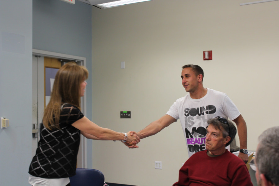 Pati MacDonald greets one of the new prospects for DVCs Veterans Alliance Club.