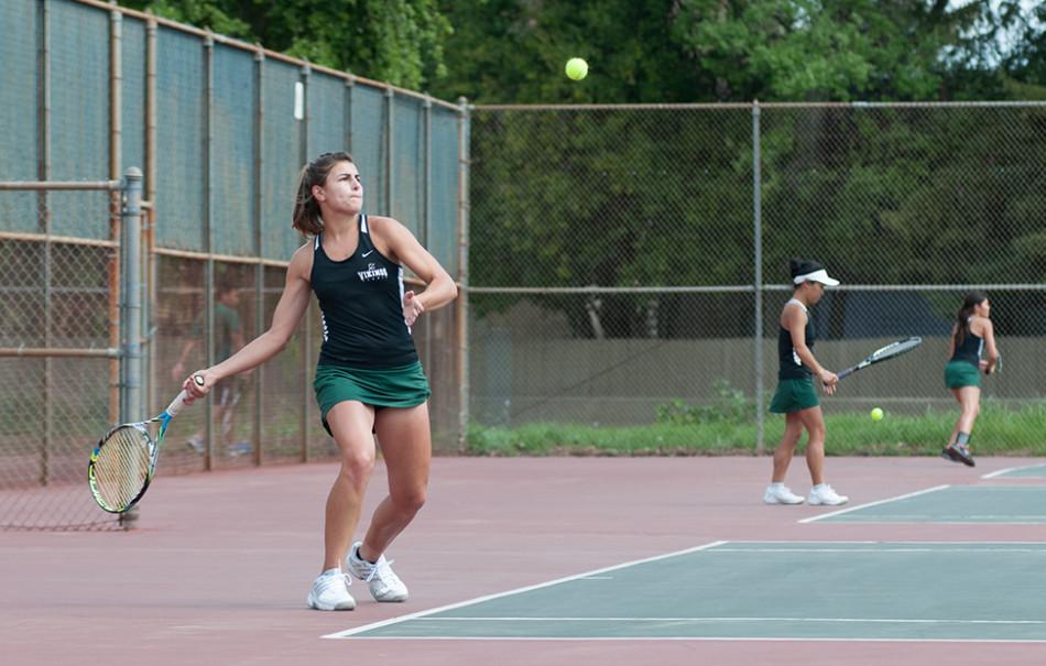 Chelsea Corby displays her forehand shot as she returns a ball from a Folsom Lake Falcon.

Both Mens and Womens tennis won their matches at home, on Friday, March 28.
