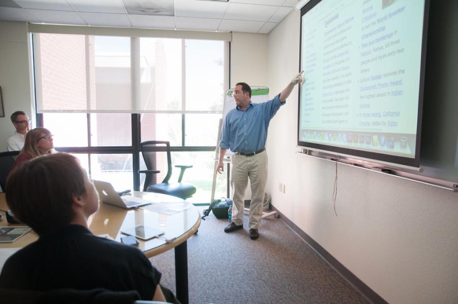 Frank Schulenburg, the executive director of Wiki Education Foundation, demonstrates ways to use  Wikipedia in class to Diablo Valley College instructors on Tuesday, May 6, 2014 in the DVC library.