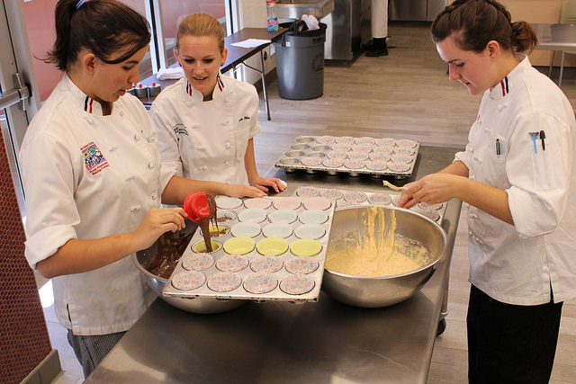 Brianna Carbajal, Sadie Moe and Grace Foley, culinary arts students make cupcakes in the new demonstration room of the Hospitality Services Food Court Building on Sept. 18, 2014. Shane Louis / Inquirer