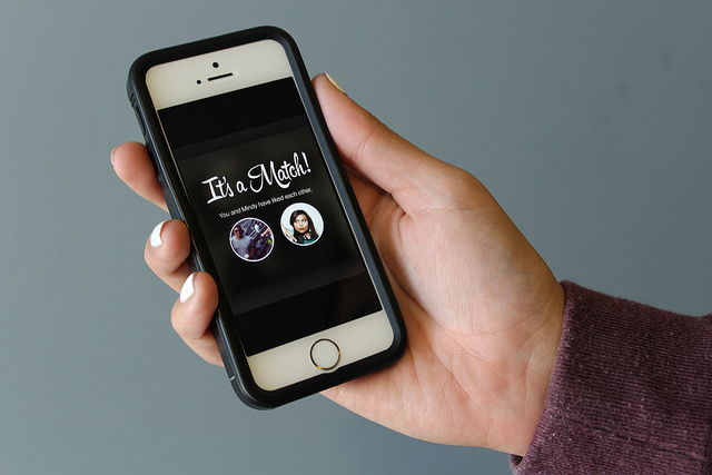 Tinder matches up users based on compatibility and user preferences.