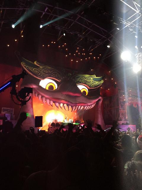 The menacing dragon eyes watch ravers in Slaughterhouse, the main stage at Escape All Hallows Eve where Chainsmokers was performing. 