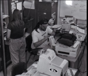 Former sports editor Aaron Williams works in the cramped quarters of the old Inquirer lab in 1995.