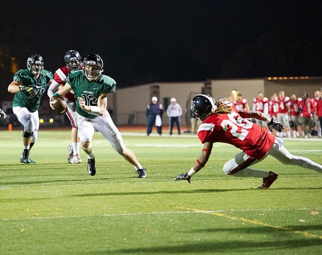 Quarterback Adam Wood rushes for a game-winning touchdown against Santa Rosa Junior College on Friday, Nov. 14 at DVC