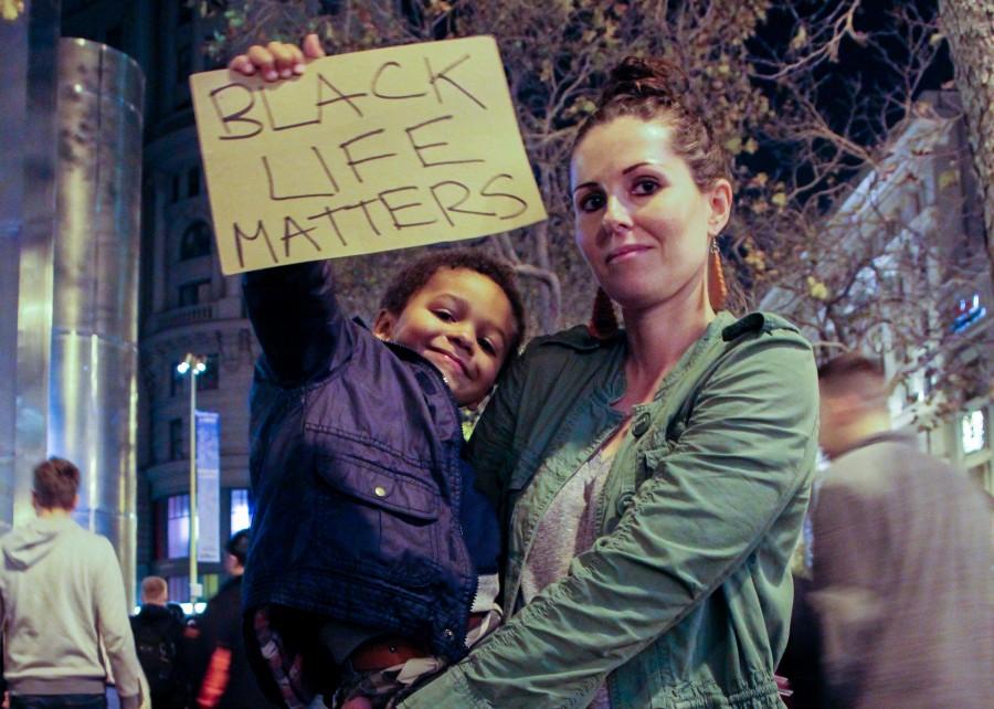 Porcia+Thurston+and+her+son+Darius+join+the+Black+Friday+protest+on+Market+Street+in+San+Francisco+on+Nov.+28.