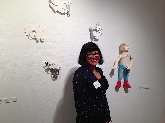 Edith Garcia, stands next to her work Constant Same Forever. At the DVC opening exhibit of Not Too Funky. 