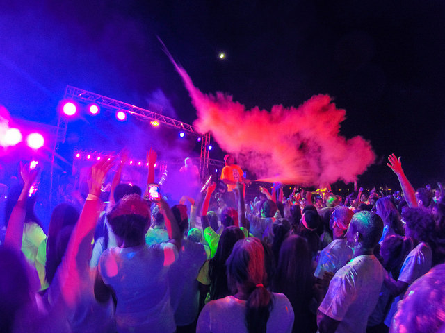 Runners gather around the stage after their 5K run to rave at the Color Fun Fest. in San Jose on January 31, 2015.