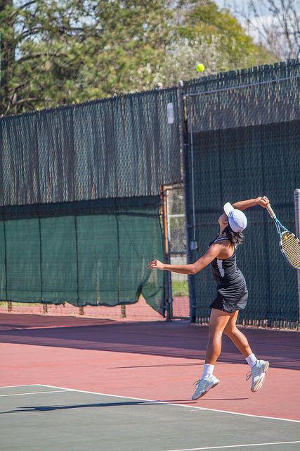 Pauline Asuncion Serving During Her Match Against Folsom Lake on February 27th, 2015 at the DVC Pleasant Hill Campus.