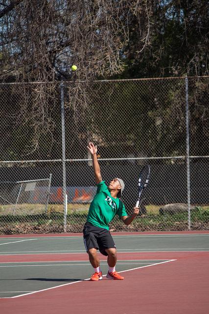Matt Concha Serving During His Match Against Folsom Lake on February 27th, 2015 at the DVC Pleasant Hill Campus