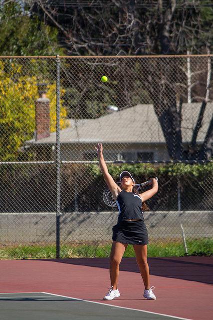 Stephanie Schenk Serving During Her Match Against Folsom Lake on February 27th, 2015 at the DVC Pleasant Hill Campus