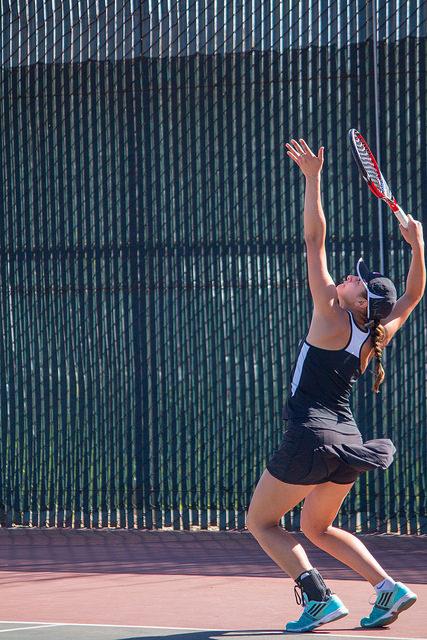 Chelsea Corby Serving on Her Match Against Folsom Lake on February 27th, 2015 at the DVC Pleasant Hill Campus.
