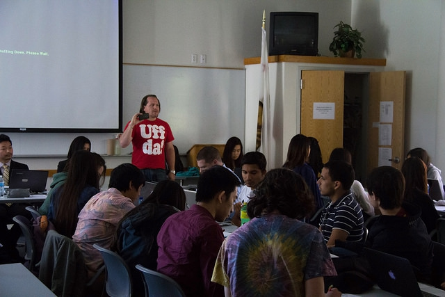 ASDVC members look down as Keith Montes defends the comments he made on Facebook about the ASDVC election results at the ASDVC meeting in the Student Union Conference Room on Tuesday, April 14, 2015.